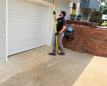 Spider web removal and exterior pest control service by TLC Upstate Lawn & Pest in the Mauldin