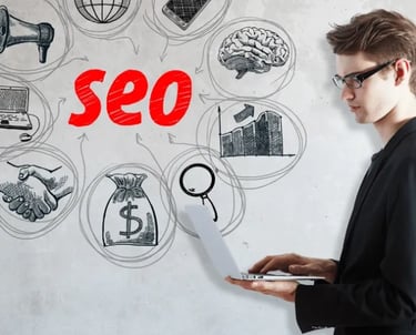 man with computer doing SEO in Calgary