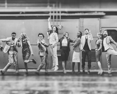 A group of playful business people, black and white