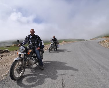 Nick Billington riding the Leh to Manali highway over the great Himalayan range, Ladakh, India 
