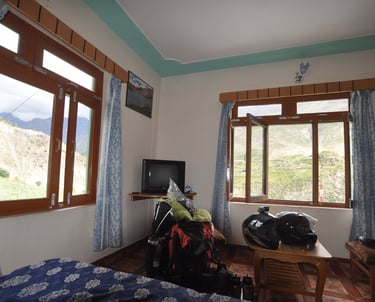Tracey Billington riding the Leh to Manali highway over the great Himalayan range, Ladakh, India 