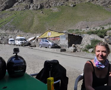Tracey Billington riding the Leh to Manali highway over the great Himalayan range, Ladakh, India 