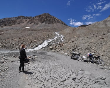 Tracey Billington riding the Leh to Manali highway over the great Himalayan range, Ladakh, India 