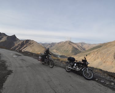 Tracey Billington riding the Leh to Manali highway over the great Himalayan range, Ladakh, India 