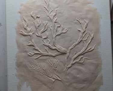 Polymer clay relief on canvas sculpture in progress.