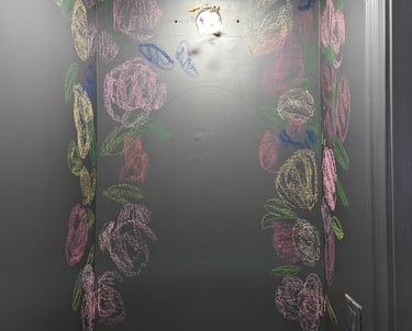 When sketching in a mural, try using colored chalk. It stands out and you can paint right over it with no issues.