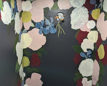 Peonies, flower, foliage and leaves building up over the colored chalk sketched for a wall mural.