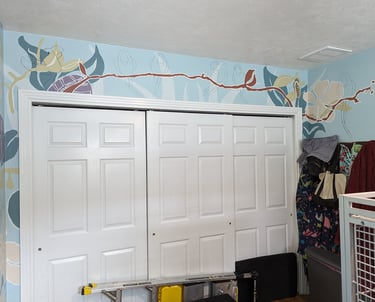 Using bright contrasting color shapes for a bright stylist interior wall mural.