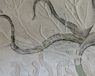Close up photo of a relief mural being made with joint compound. Sculpting and building up thickness with EasySand 90.