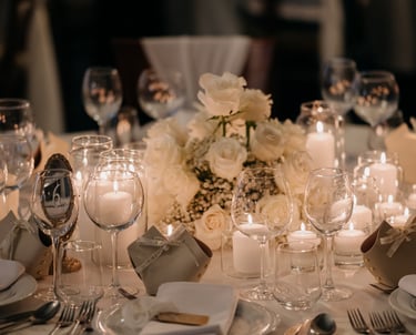 a table setting with candles and candles