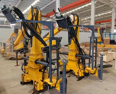 Customer order: Yellow ZM66.2 truck-mounted forestry cranes, pictured at our production facility.