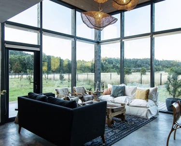 a living room with a couch and a table