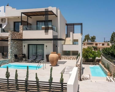 Modern luxury villa in Greece with private swimming pools and terrace.