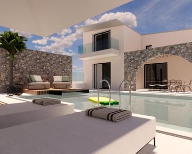 Luxury modern villa with private pool, stone walls, and sun loungers under a bright blue sky.