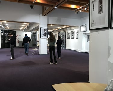 first photo of the art workshop students visiting the exhibition