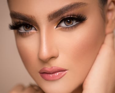 a woman with a very big eye makeup and a very pretty face