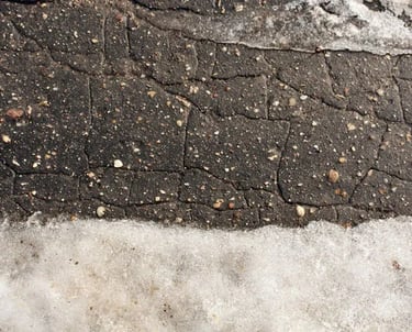 Asphalt cracks caused by freezing southern Ontario weather