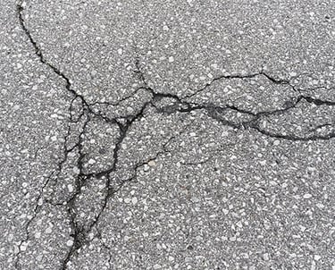 Cracked asphalt example