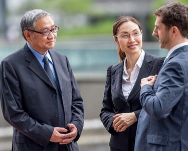 Asian Executive is talking to the interpreter