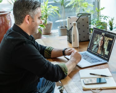 Man is consulting client online
