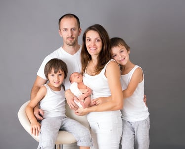 a family portrait of a man and two children