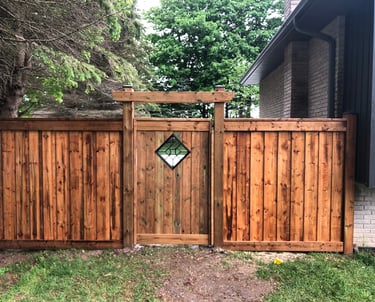 Image of previous project of a stained fence
