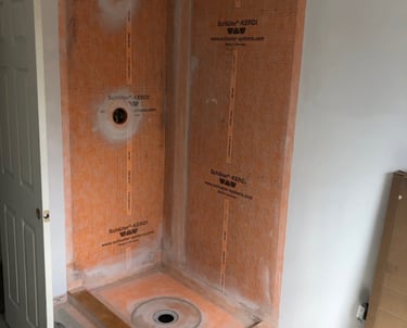 Image of old project showing a shower pan installation