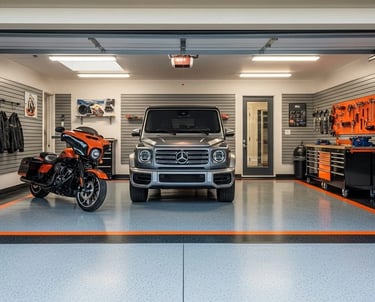 Modern Garage featuring a clean polyaspartic epoxy floor, wall-mounted tools, and organized storage.