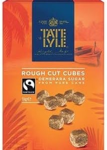 Tate & Lyle Fairtrade Rough Cut Demerara Sugar Cubes in a 1kg orange and blue box.