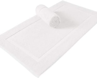 a rolled up towel rug with a rolled up towel