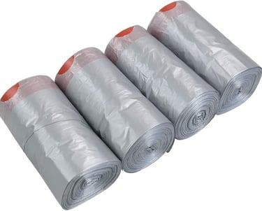 a group of four rolls of plastic bags