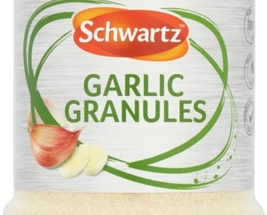 Schwartz Garlic Granules in a large plastic jar with a green lid for seasoning and cooking.