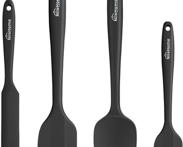 a set of three spatulables with a black and white spatulable
