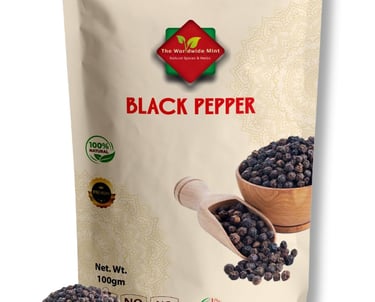 A 100g pouch of The Worldwide Mint organic black pepper whole corns with a wooden scoop and bowl.