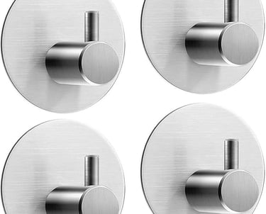 a set of four metal wall mounted hooks