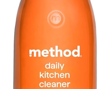 a bottle of cleaning products with a cleaning cloth on it