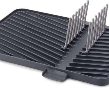 a black and white tray with a bunch of knives and knives
