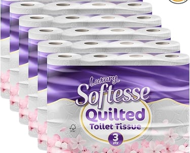 A bulk 60-pack of Softesse Quilted 3-ply luxury toilet tissue rolls with cherry blossom packaging.