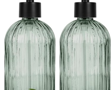 a pair of soap dispensers with tulips and tulips