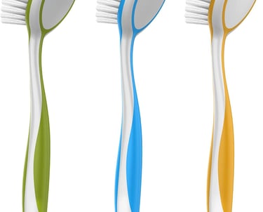 Set of three colorful dish brushes with ergonomic handles and nylon bristles for kitchen cleaning.