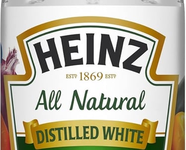 Heinz All Natural Distilled White Vinegar 32 fl oz bottle for cooking and cleaning.