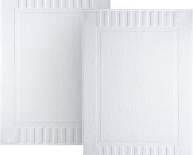 a pair of bath mats with a white background