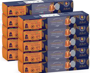 A bulk pack of Nespresso compatible Colombian coffee capsules in blue and orange boxes.