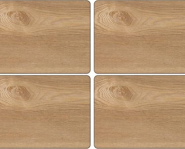 four wooden coasters with a wooden surface