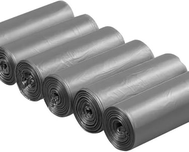 a group of rolls of black plastic bags