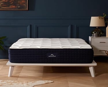 a mattress that is sitting on a wooden floor