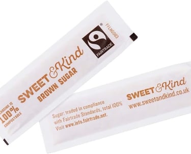 a couple of white toothbrushes with a white label on it