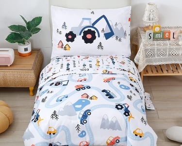 a bed with a bed and a teddy bear