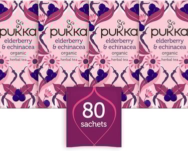 a bunch of pink tea bags with a pink flower
