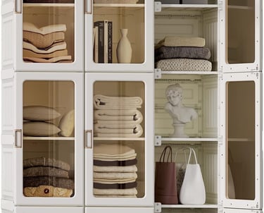 a cabinet with many towels and towels on it